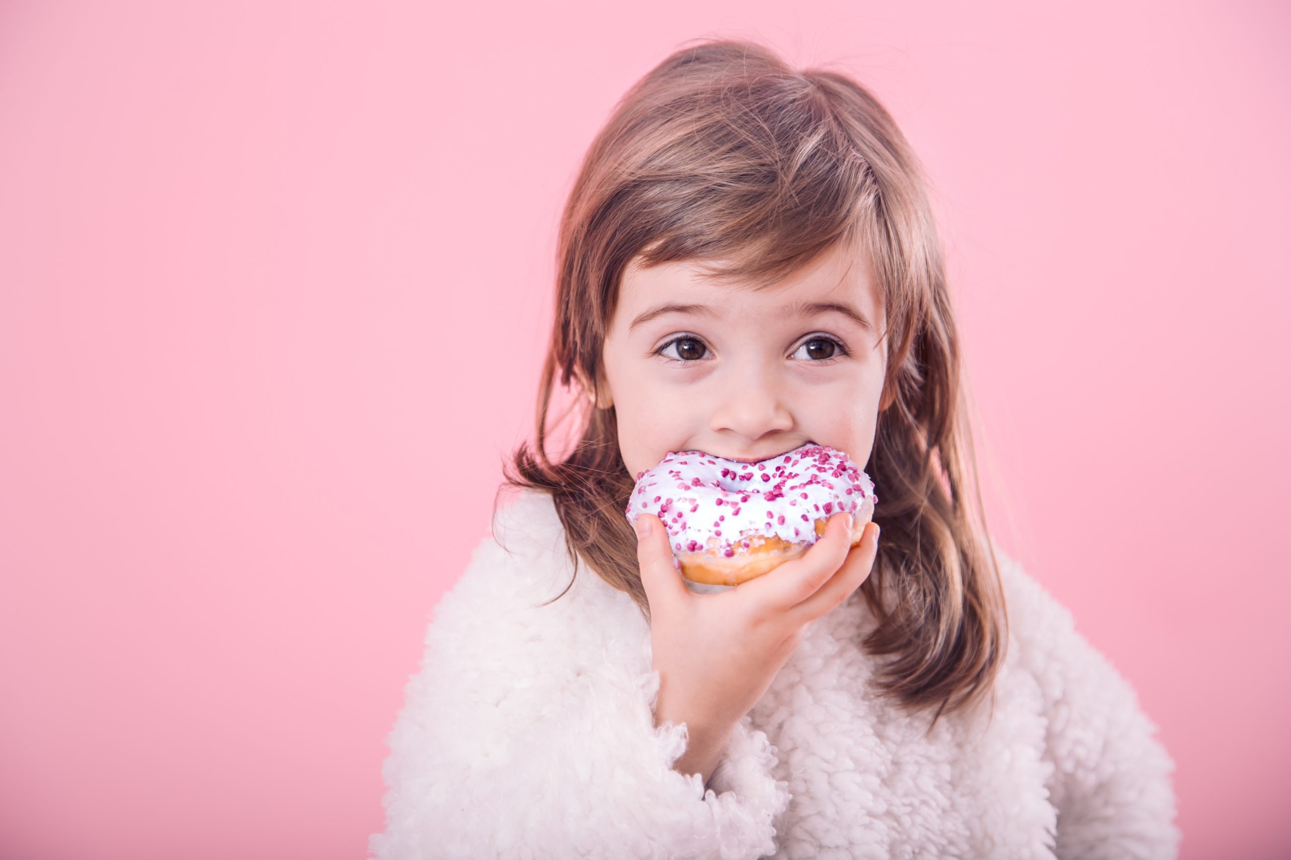 portrait-cute-little-girl-with-donut-scaled.jpg