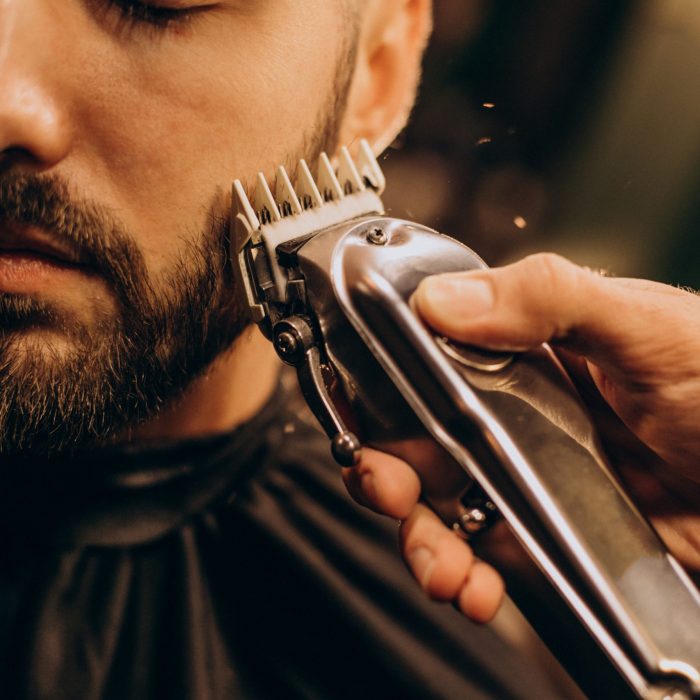 handsome-man-barbershop-shaving-beard-scaled.jpg